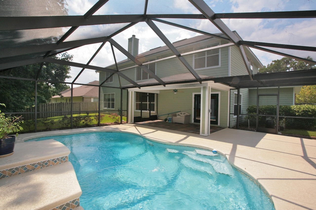 2536 Benjamin Road Jacksonville, FL 32223 - Photo 24 of 25 a view of a house with backyard and sitting area