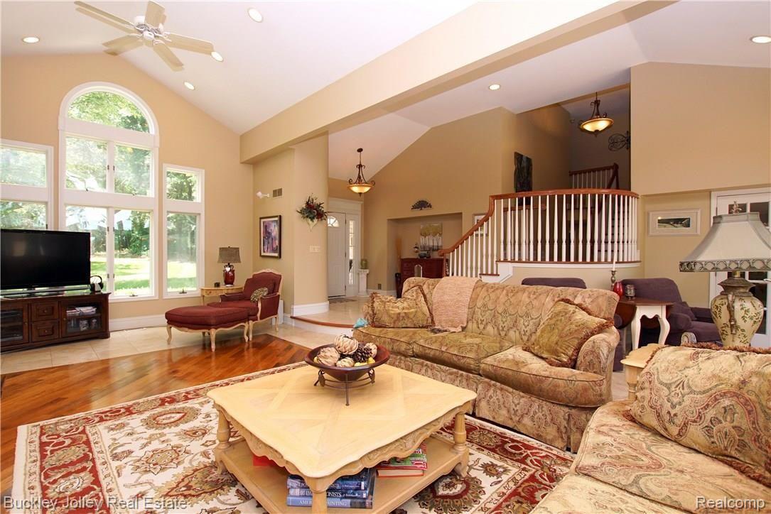 11631 Ridge Road South Lyon, MI 48178 - Photo 9 of 40 Soaring Ceilings with a Wall of Windows