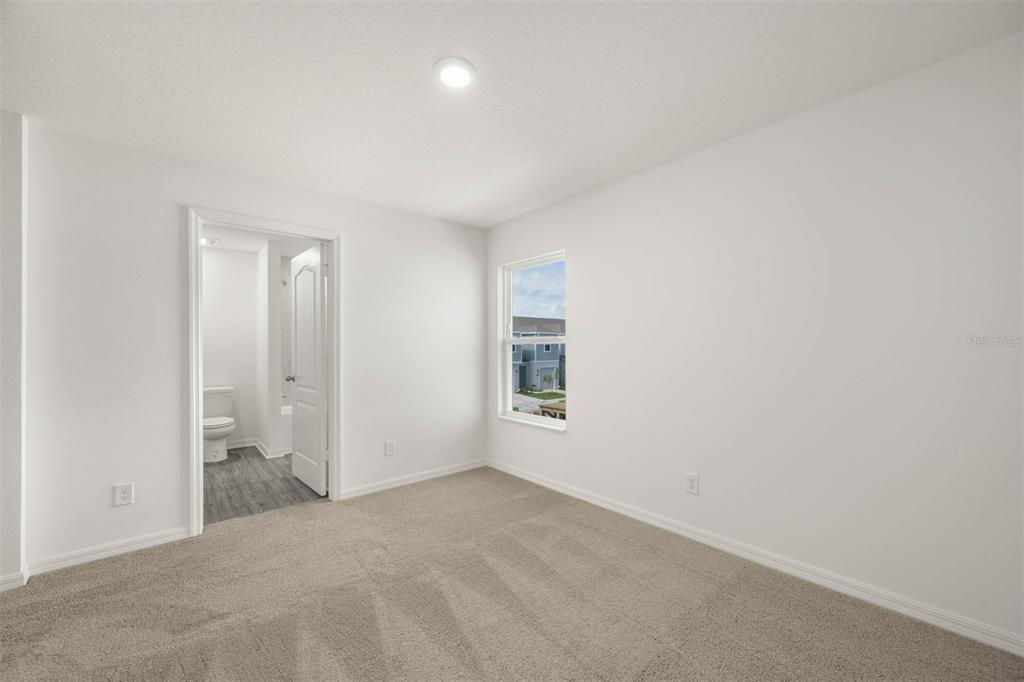 685 Poppy Lane Dundee, FL 33838 - Photo 24 of 31 an empty room with a empty space and windows