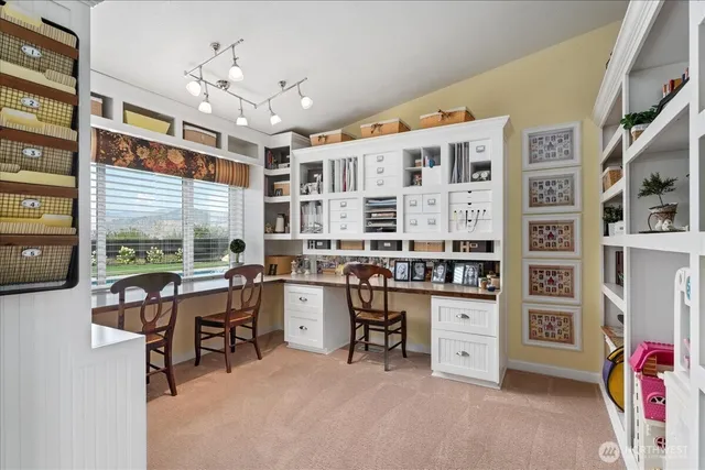 a bathroom with a double vanity sink mirror and bathtub