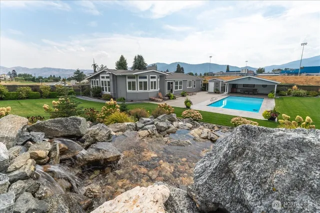 a view of a city with mountains in the background