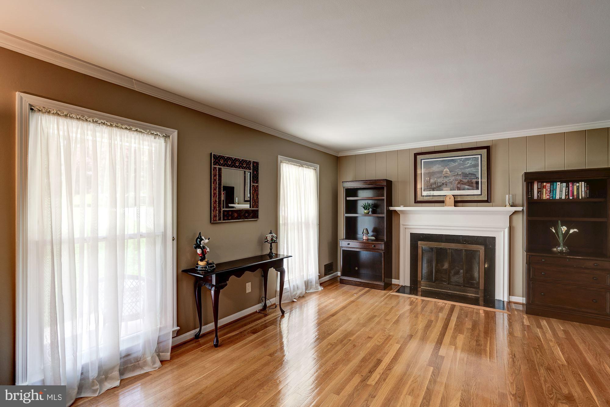 7604 Sebago Road Bethesda, MD 20817 - Photo 2 of 31 Living Room with Fireplace