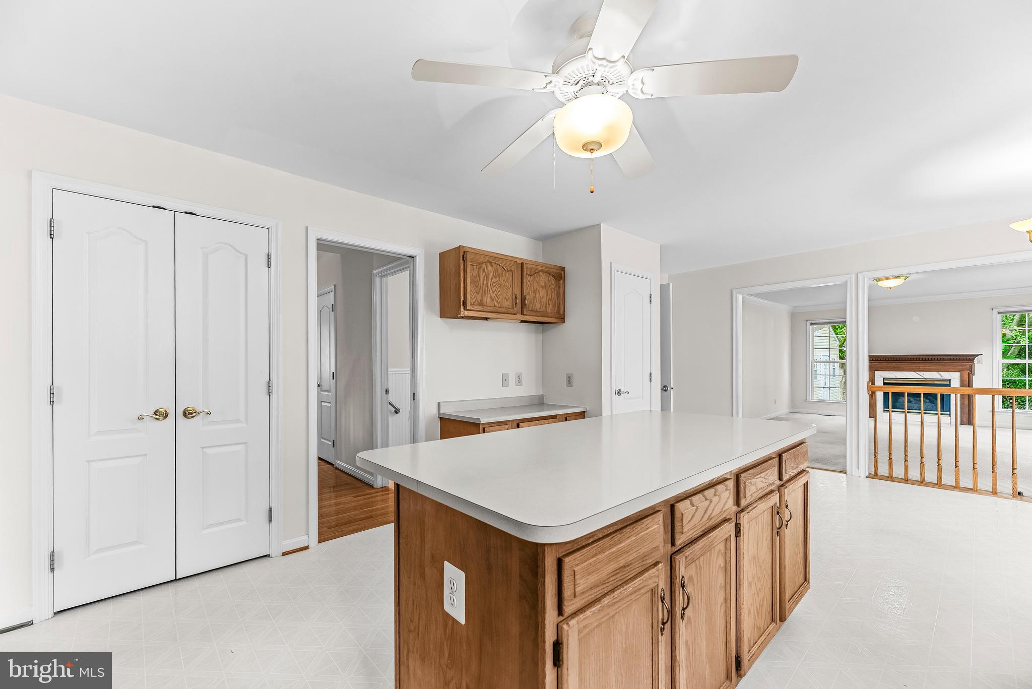 5965 Ketch Road Prince Frederick, MD 20678 - Photo 15 of 56 a kitchen that has a lot of cabinets in it