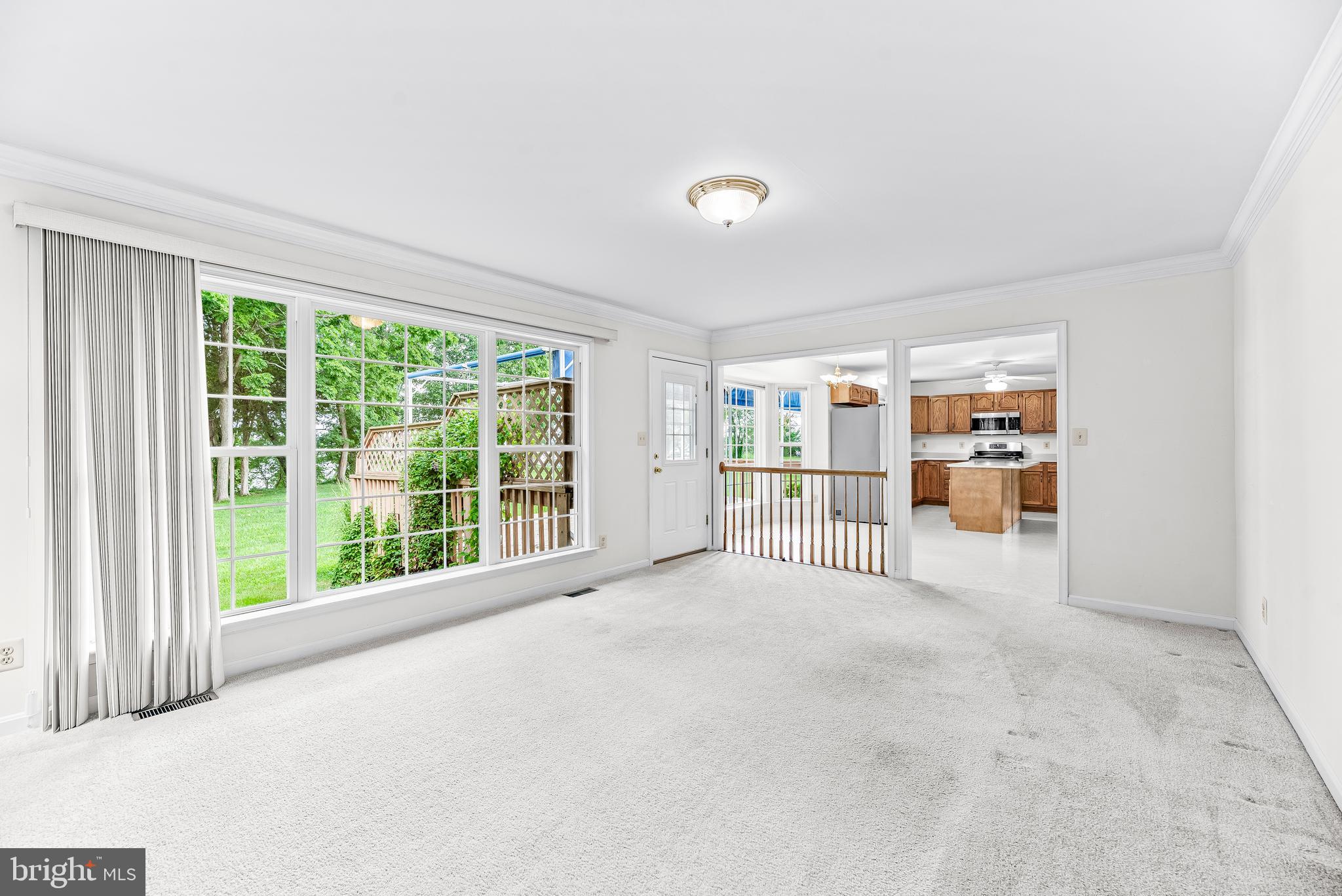 5965 Ketch Road Prince Frederick, MD 20678 - Photo 23 of 56 a view of an empty room with a large window