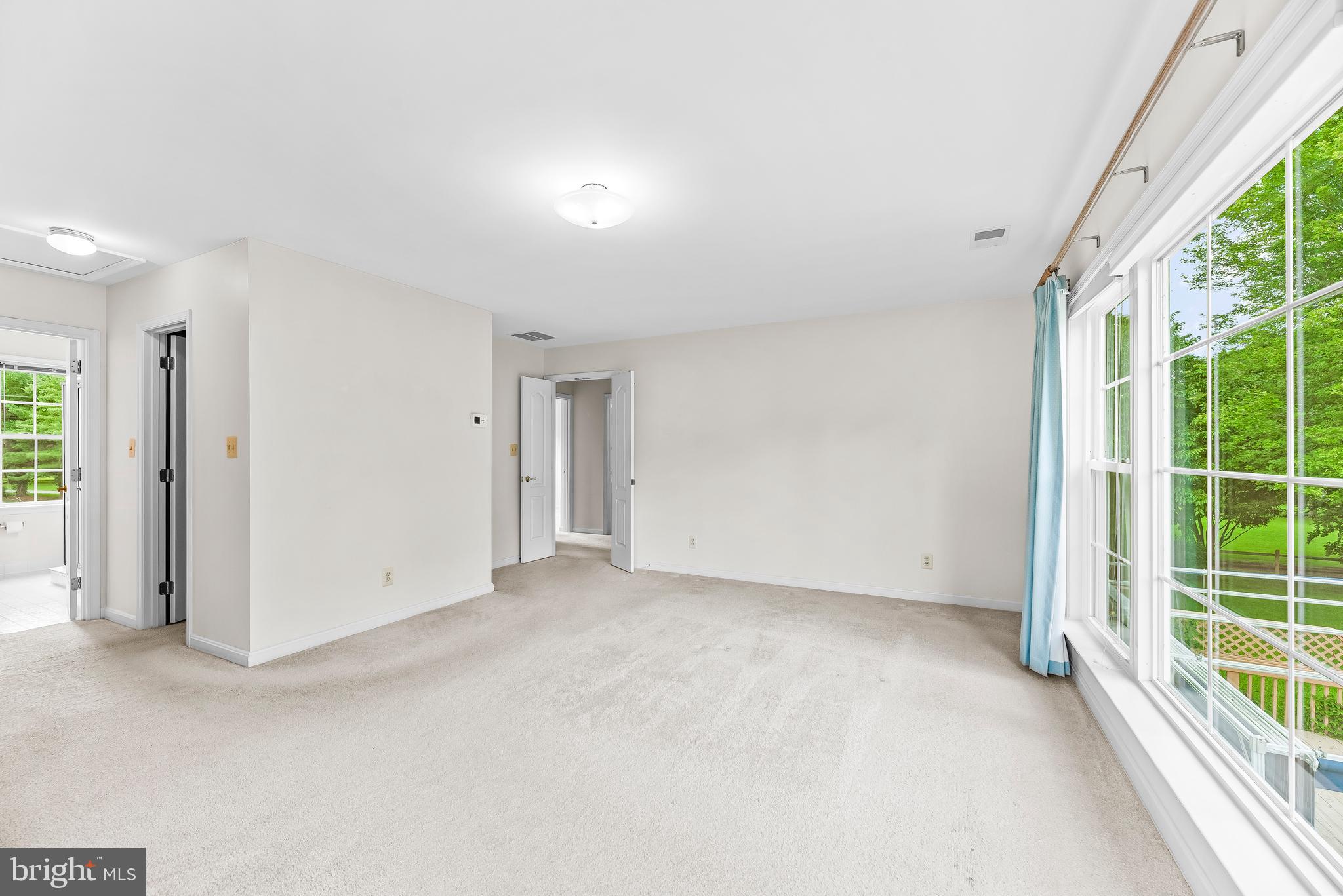 5965 Ketch Road Prince Frederick, MD 20678 - Photo 29 of 56 an empty room with windows and outdoor view