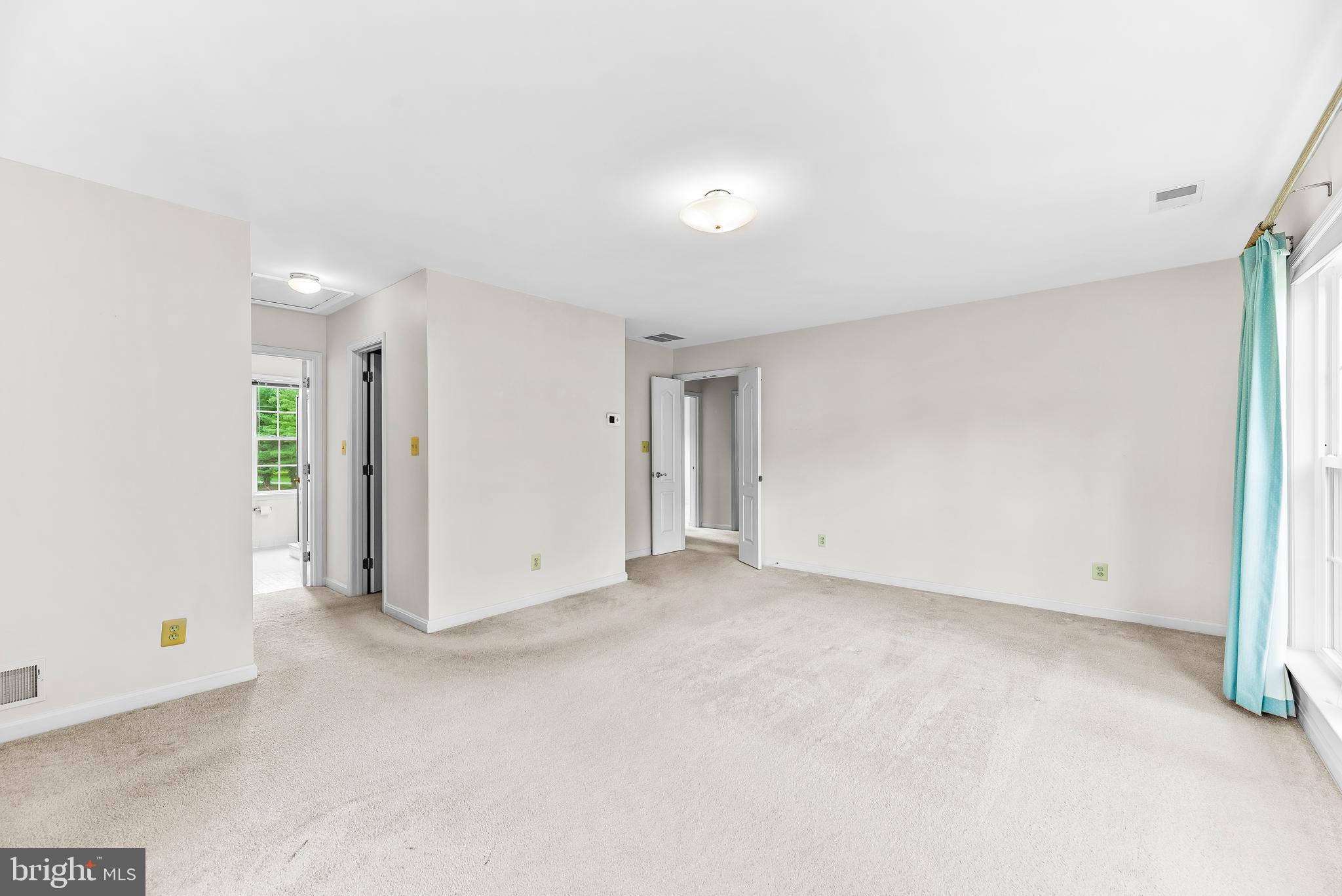 5965 Ketch Road Prince Frederick, MD 20678 - Photo 30 of 56 an empty room with an entryway