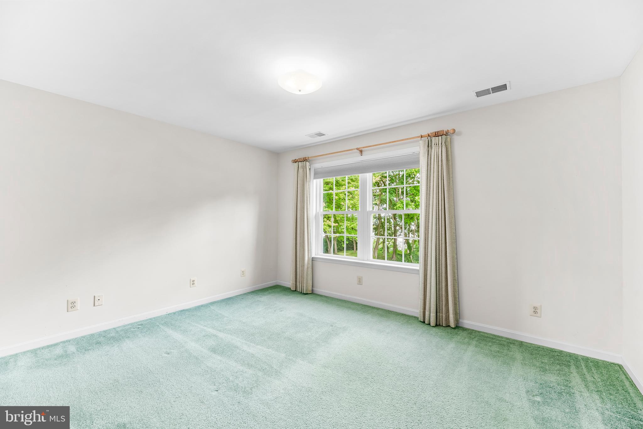 5965 Ketch Road Prince Frederick, MD 20678 - Photo 34 of 56 an empty room with a window
