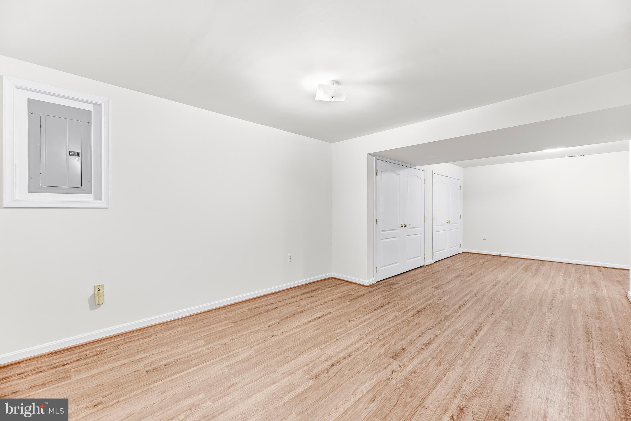 5965 Ketch Road Prince Frederick, MD 20678 - Photo 39 of 56 a view of empty room with wooden floor