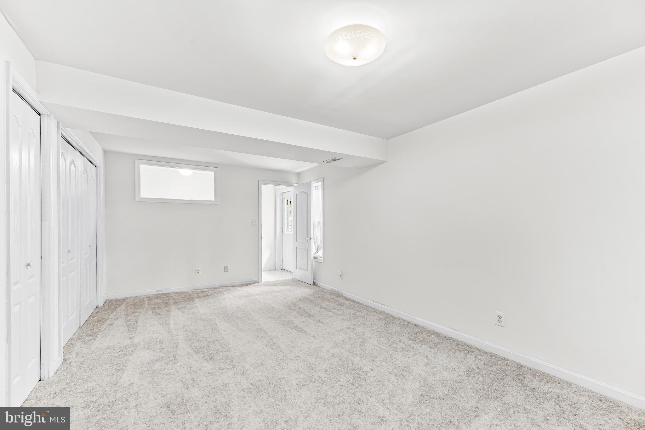 5965 Ketch Road Prince Frederick, MD 20678 - Photo 40 of 56 an empty room with windows
