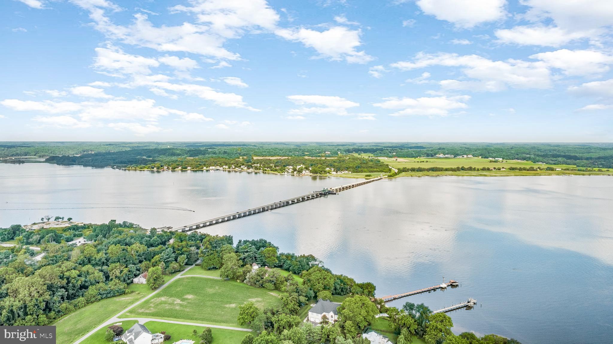 5965 Ketch Road Prince Frederick, MD 20678 - Photo 48 of 56 a view of a lake with a city