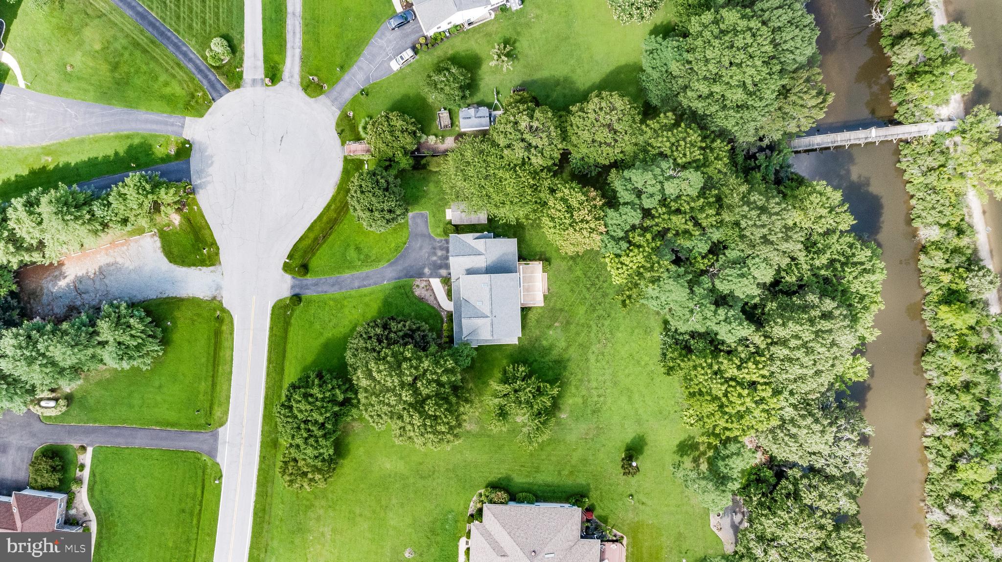 5965 Ketch Road Prince Frederick, MD 20678 - Photo 50 of 56 an aerial view of a house with a yard and garden