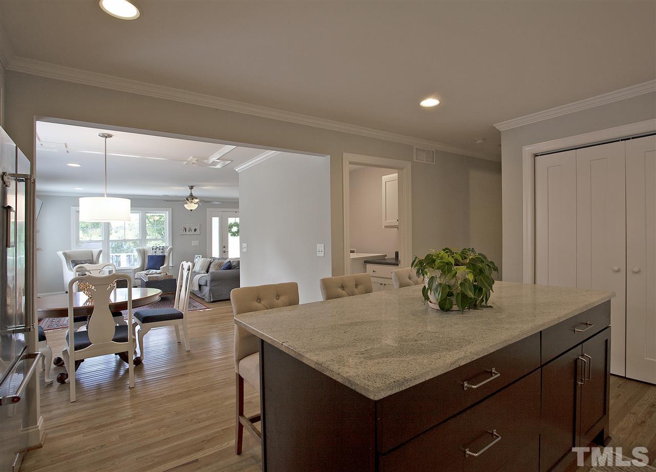 125 Plainview Avenue Raleigh, NC 27604 - Photo 11 of 27 a kitchen with a table and chairs in it