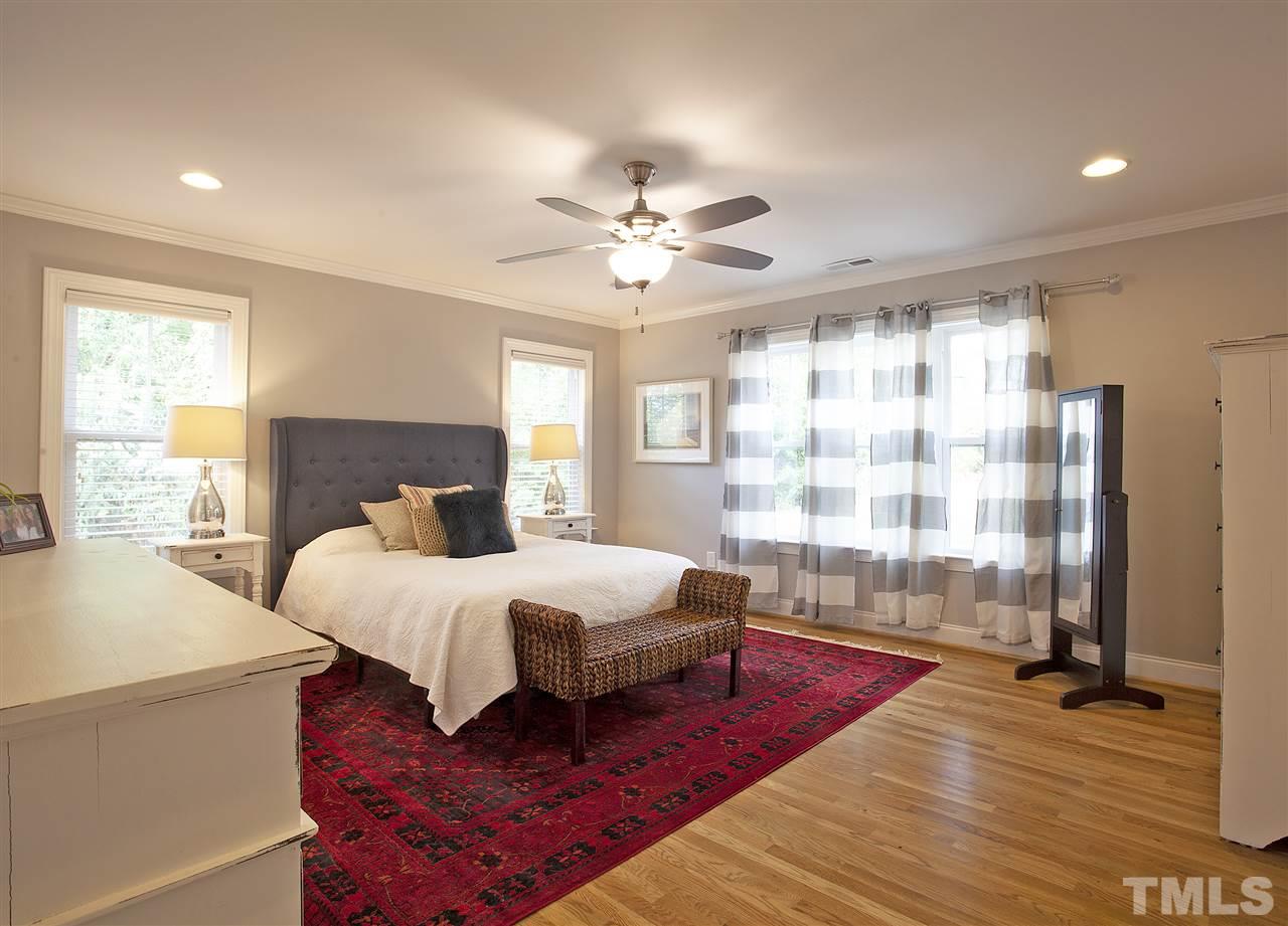 125 Plainview Avenue Raleigh, NC 27604 - Photo 13 of 27 a bedroom with a bed and window