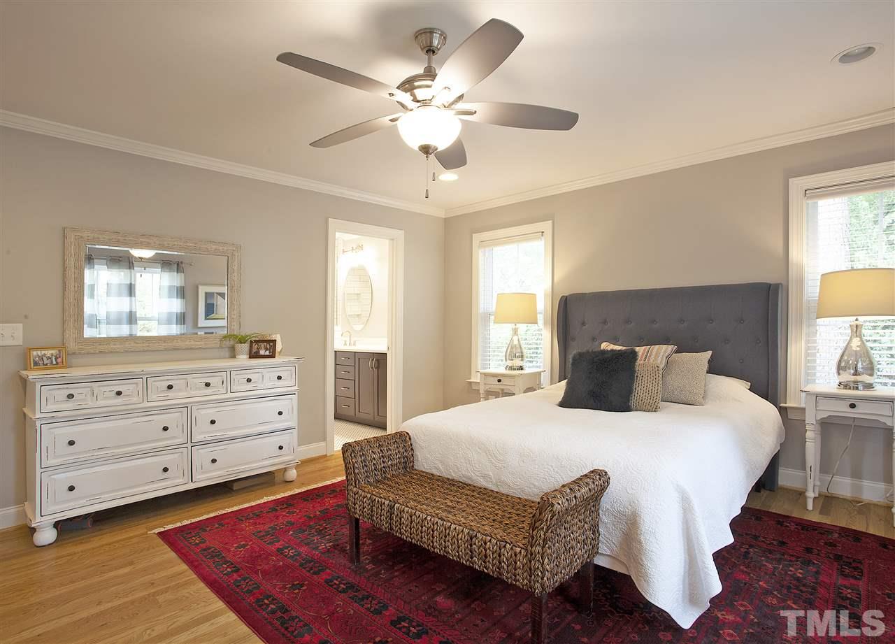 125 Plainview Avenue Raleigh, NC 27604 - Photo 14 of 27 a bedroom with a bed and window