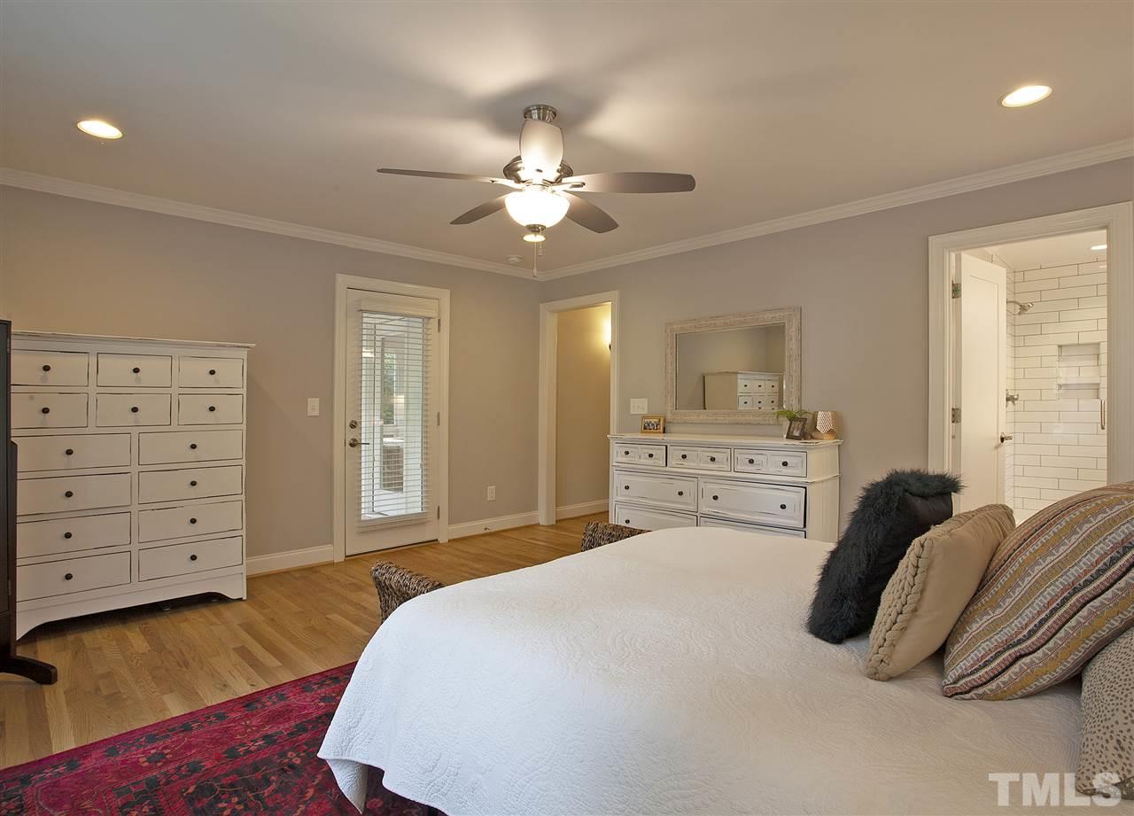 125 Plainview Avenue Raleigh, NC 27604 - Photo 16 of 27 a bedroom with a bed and dresser