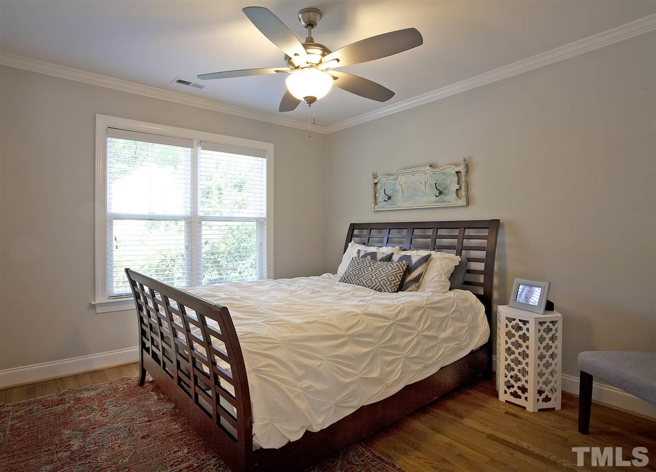 125 Plainview Avenue Raleigh, NC 27604 - Photo 19 of 27 a bedroom with a bed and a window
