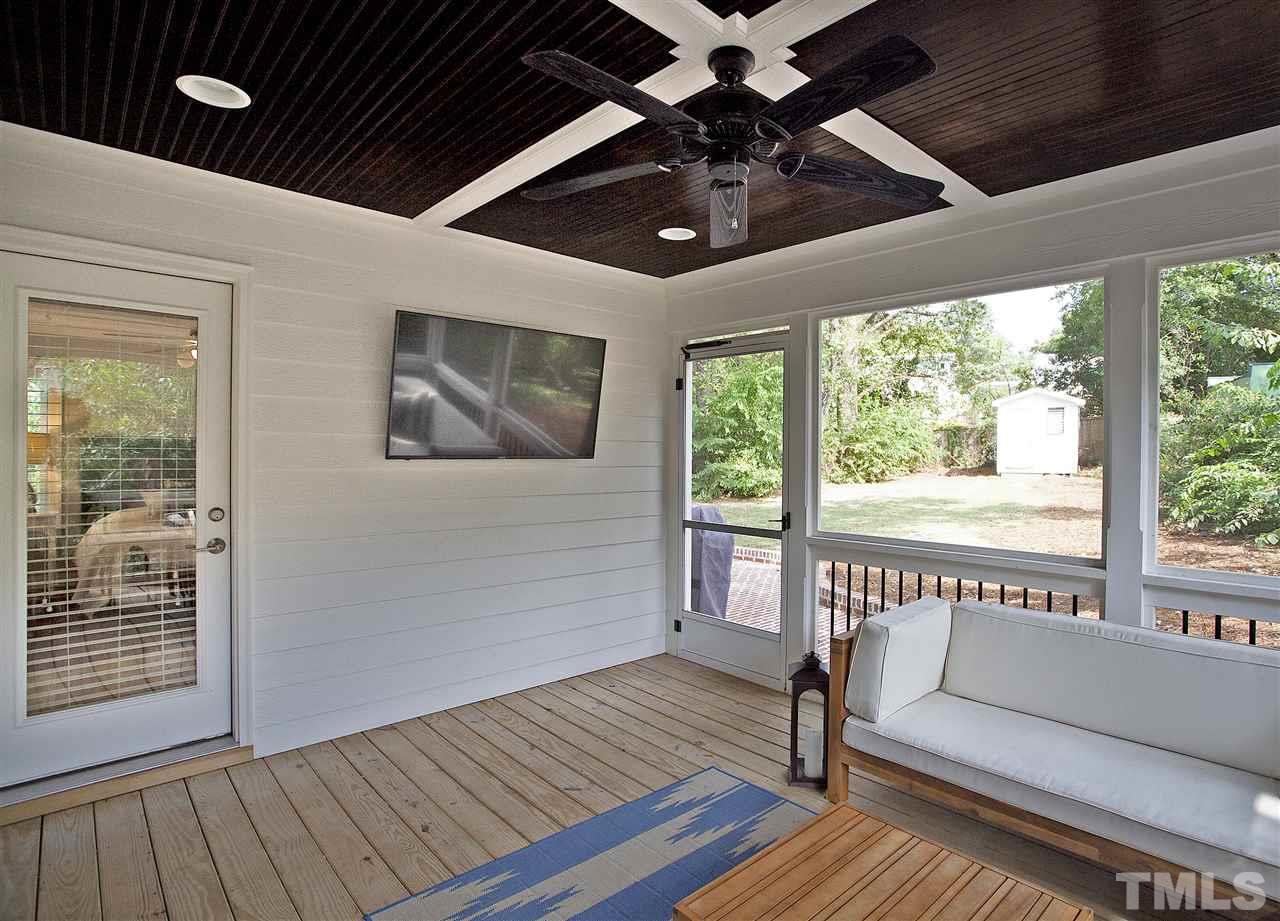125 Plainview Avenue Raleigh, NC 27604 - Photo 22 of 27 a view of an empty room with wooden floor and a window
