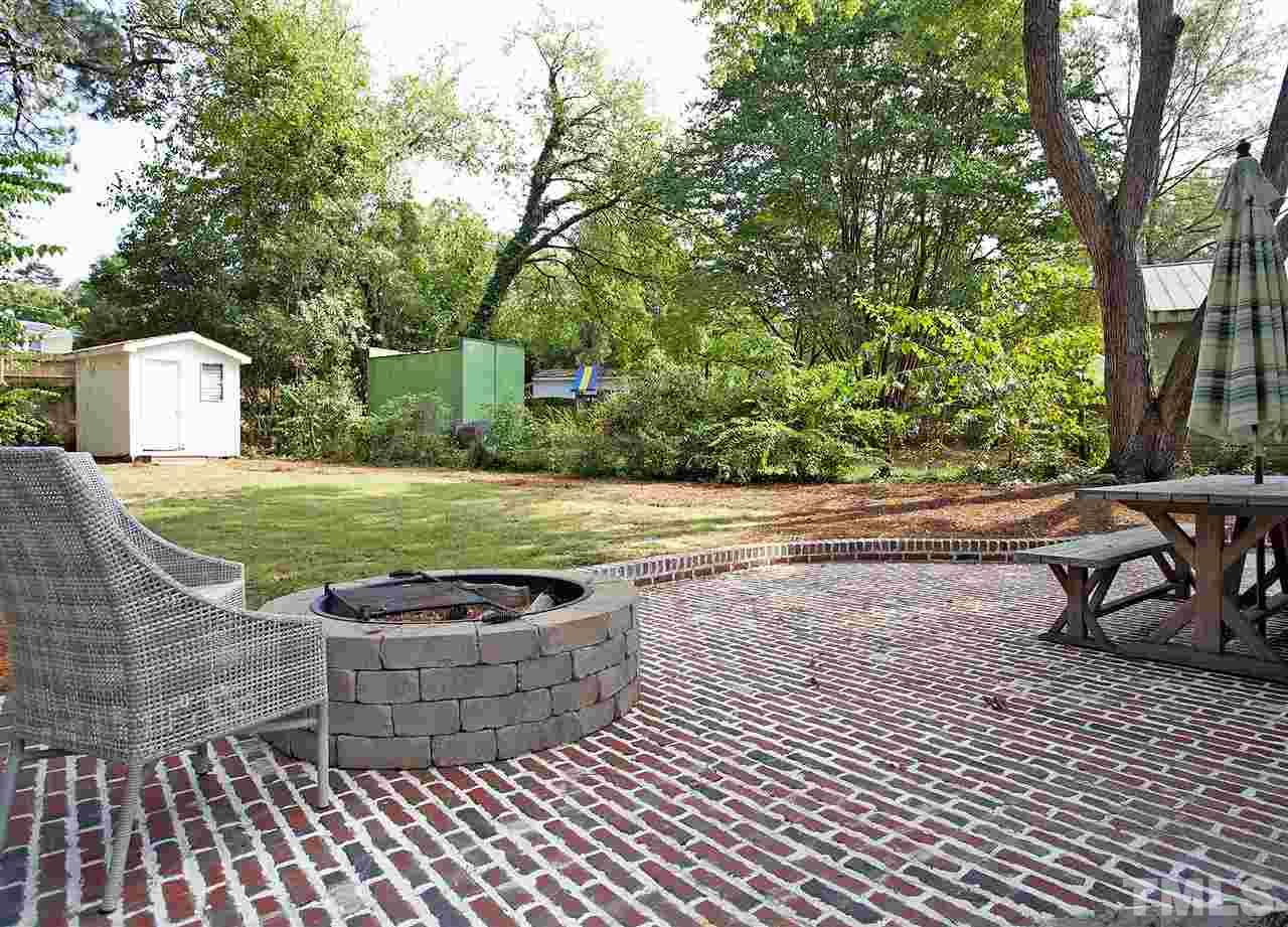 125 Plainview Avenue Raleigh, NC 27604 - Photo 24 of 27 a view of a backyard with sitting area