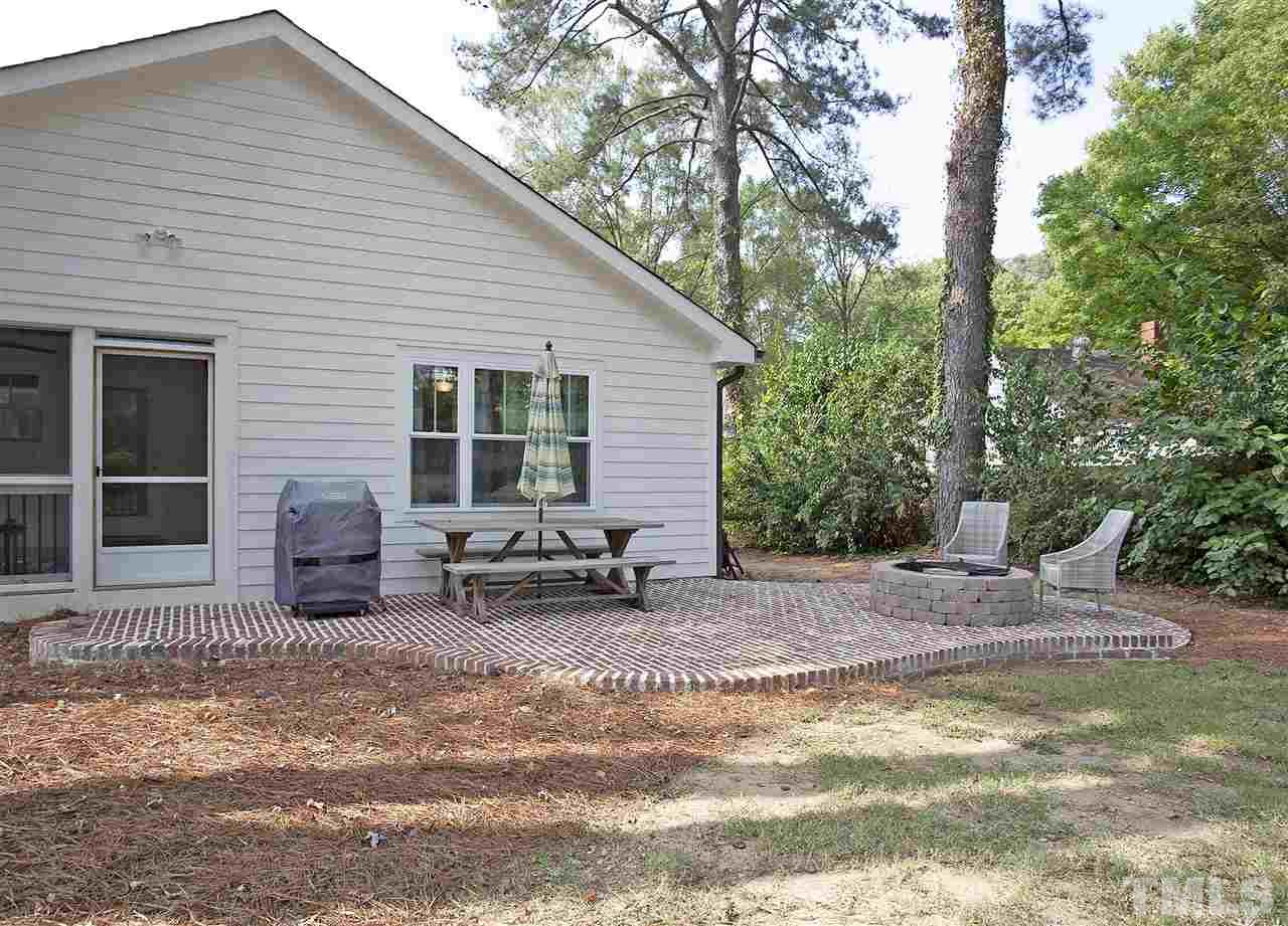 125 Plainview Avenue Raleigh, NC 27604 - Photo 26 of 27 a backyard of a house with seating space