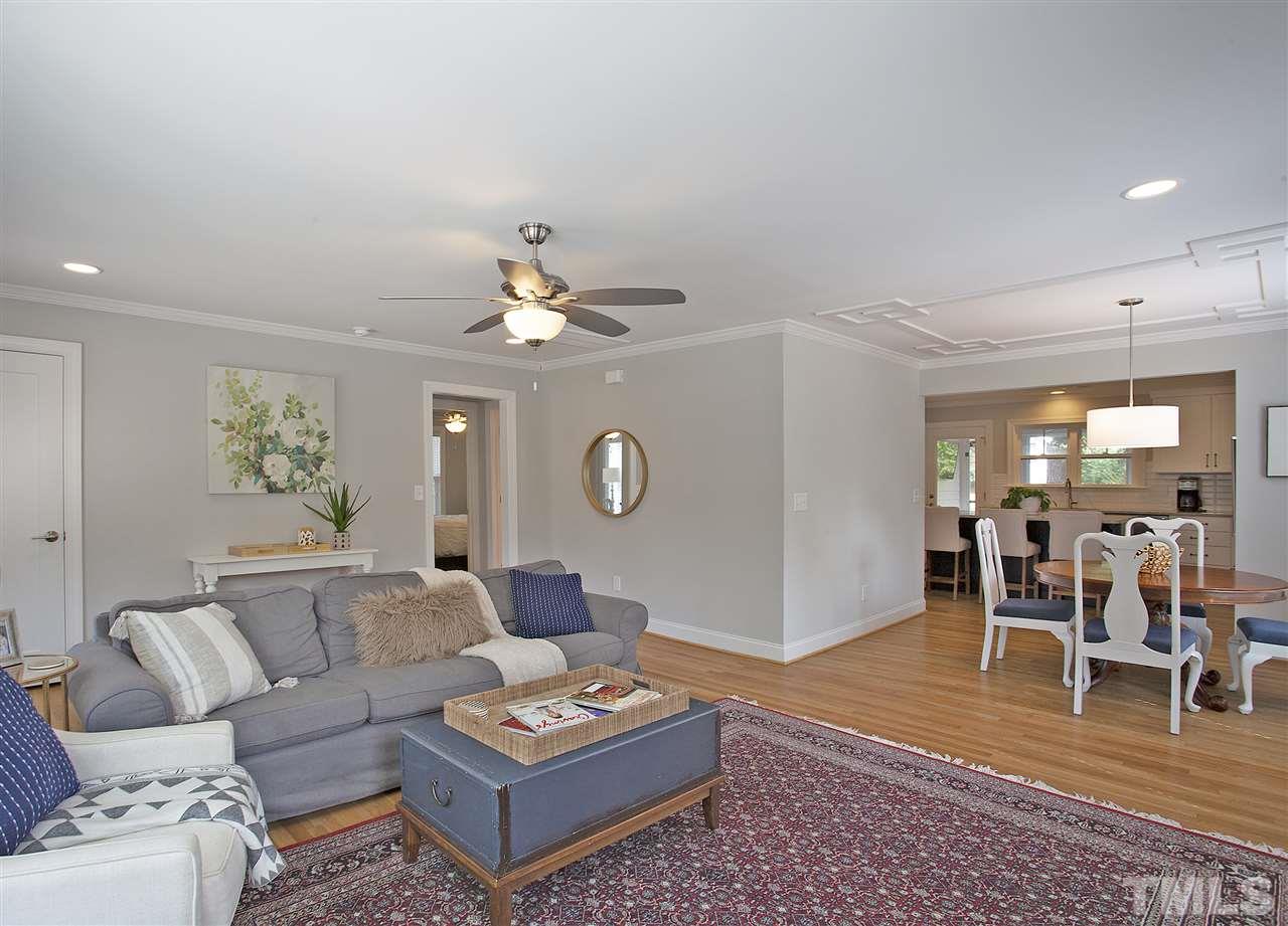 125 Plainview Avenue Raleigh, NC 27604 - Photo 6 of 27 a living room with furniture and a chandelier