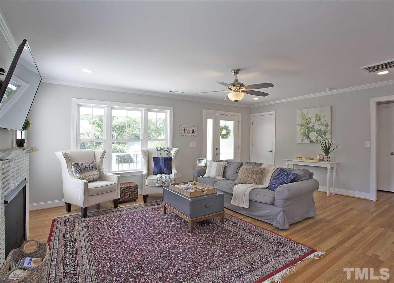 125 Plainview Avenue Raleigh, NC 27604 - Photo 7 of 27 a living room with furniture and a large window
