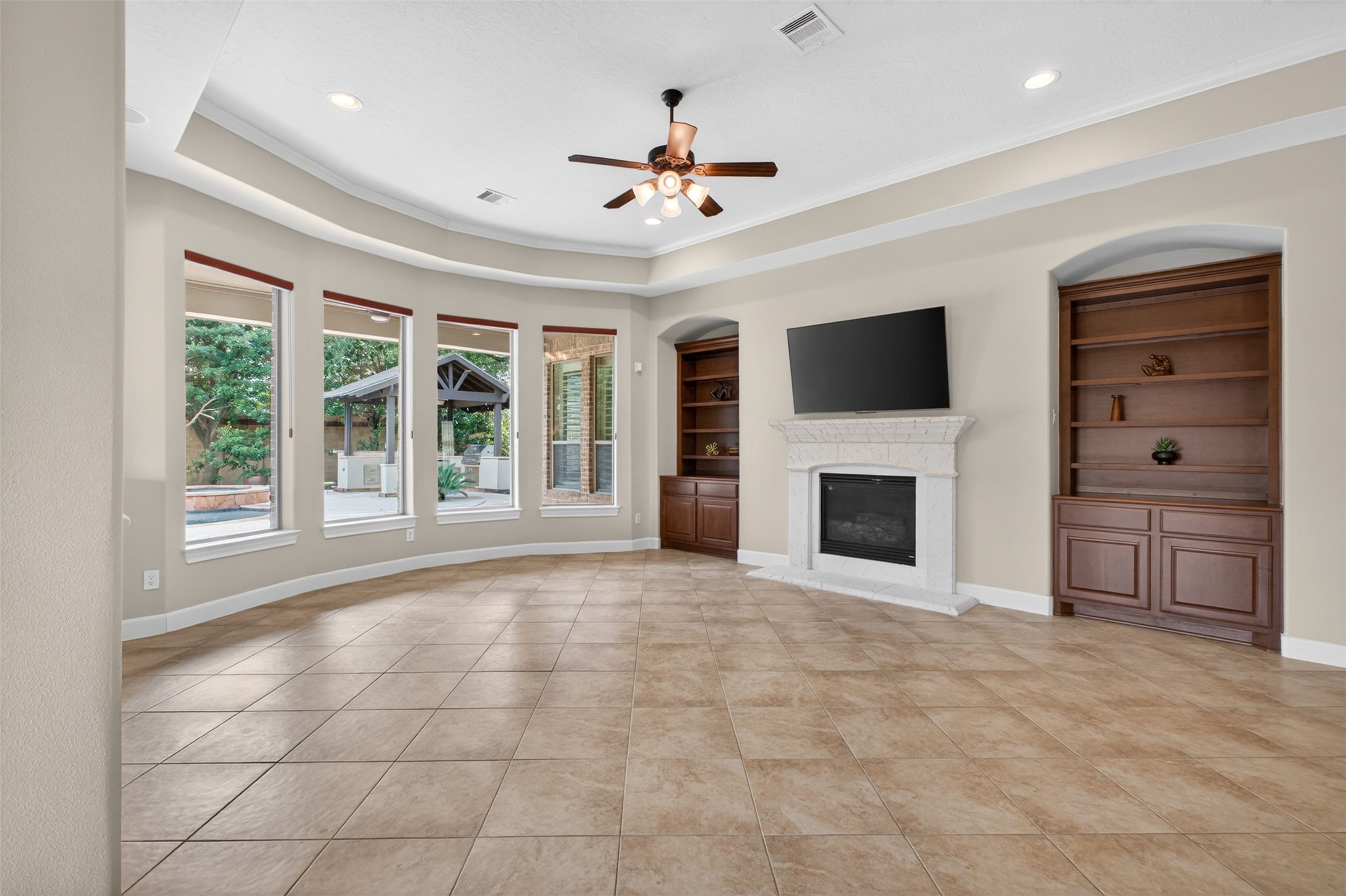 7303 Starry Night Katy, TX 77494 - Photo 8 of 42 Family room with double built in bookcases.