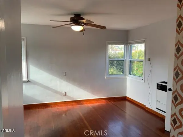 a view of livingroom with hardwood floor and window
