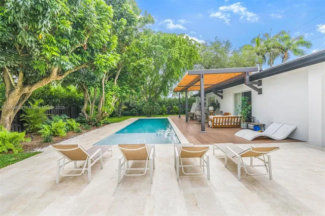 a view of outdoor space yard deck patio and outdoor kitchen