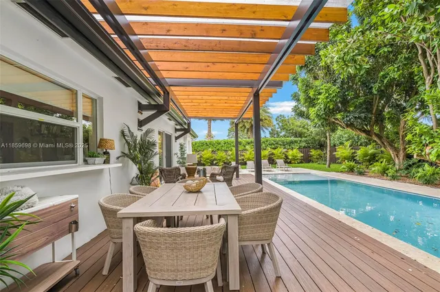 an aerial view of a house with a garden