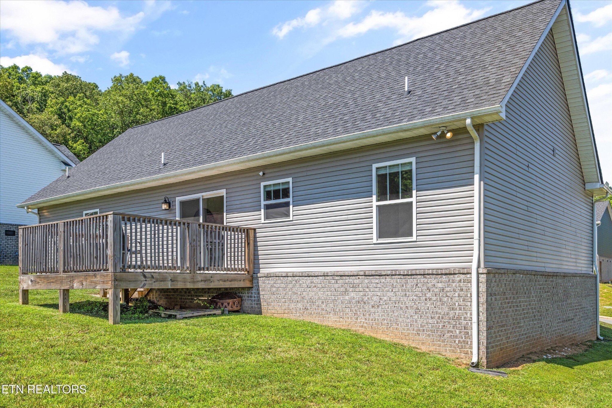 207 Daniel Morris Point Clinton, TN 37716 - Photo 24 of 42 a house view with a garden space