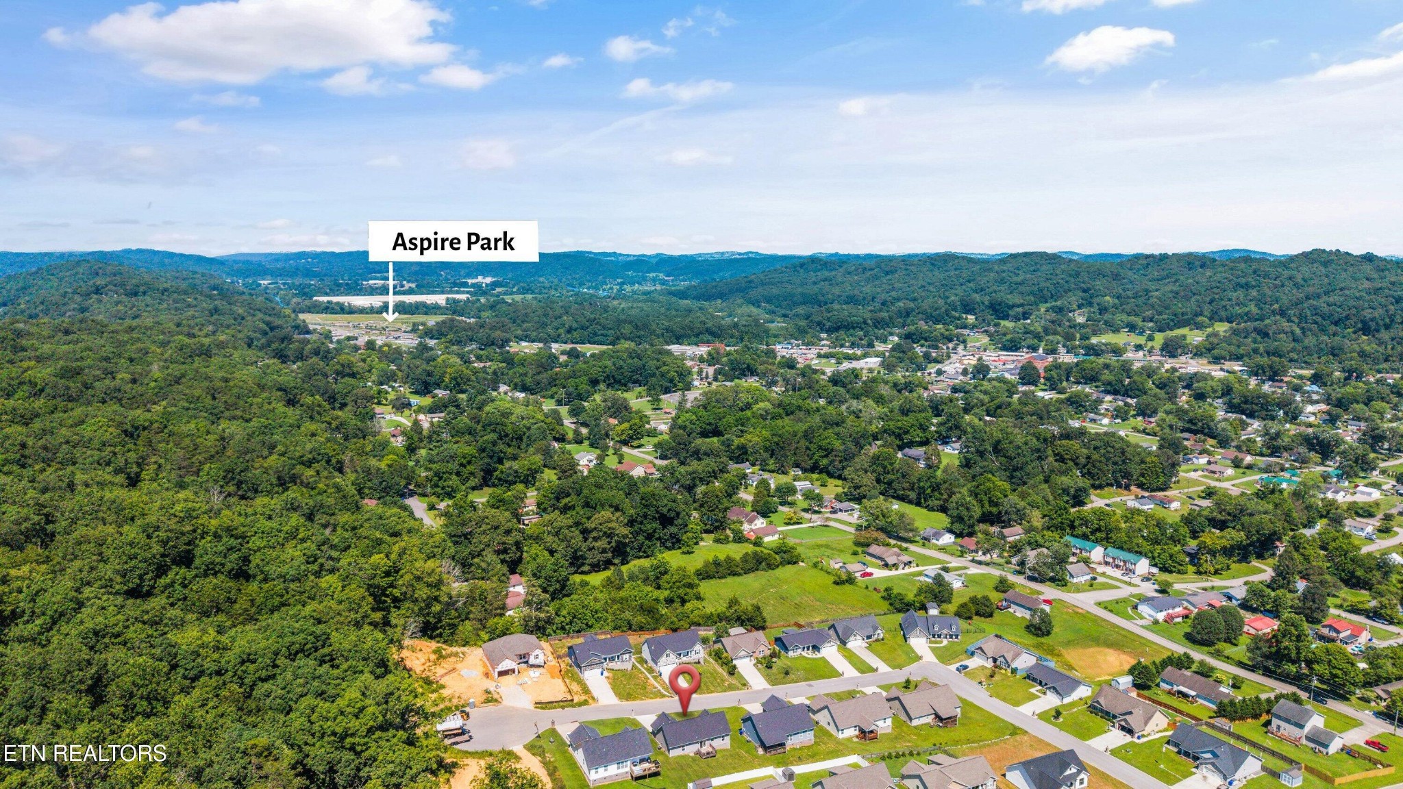 207 Daniel Morris Point Clinton, TN 37716 - Photo 30 of 42 a view of a city with lush green forest