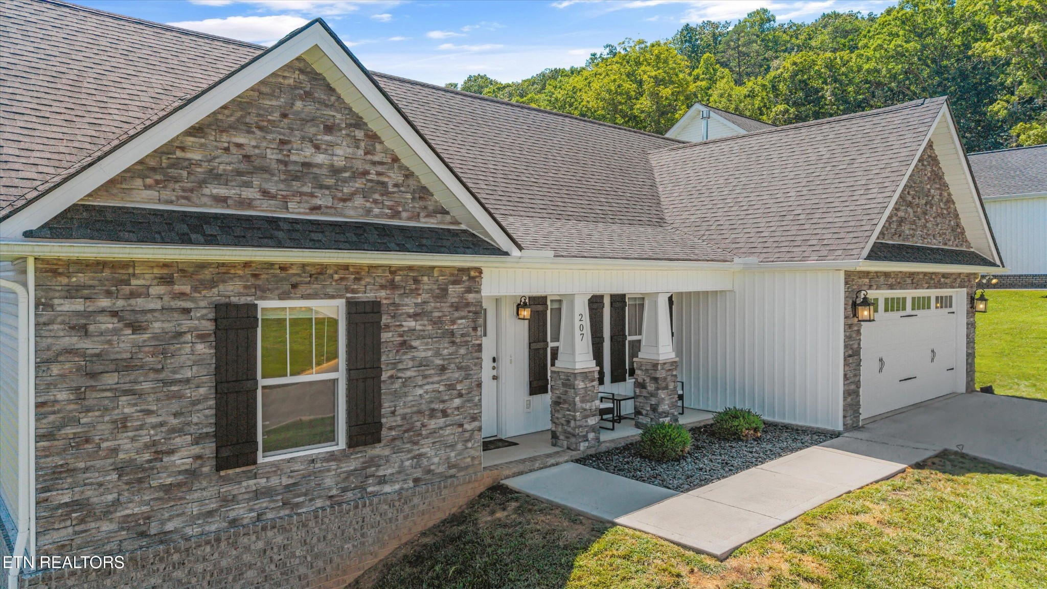 207 Daniel Morris Point Clinton, TN 37716 - Photo 39 of 42 view of house with backyard porch and entertaining space