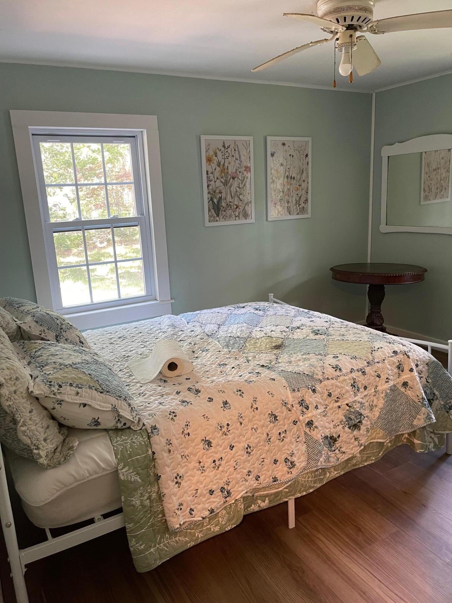 25 Walker Road Eastham, MA 02642 - Photo 13 of 17 a bedroom with a bed and a window