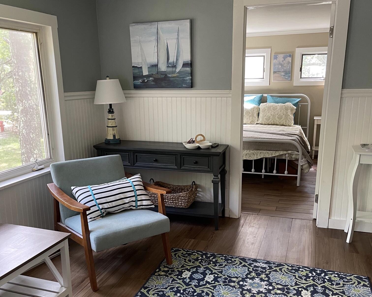 25 Walker Road Eastham, MA 02642 - Photo 4 of 17 a living room with furniture and a window