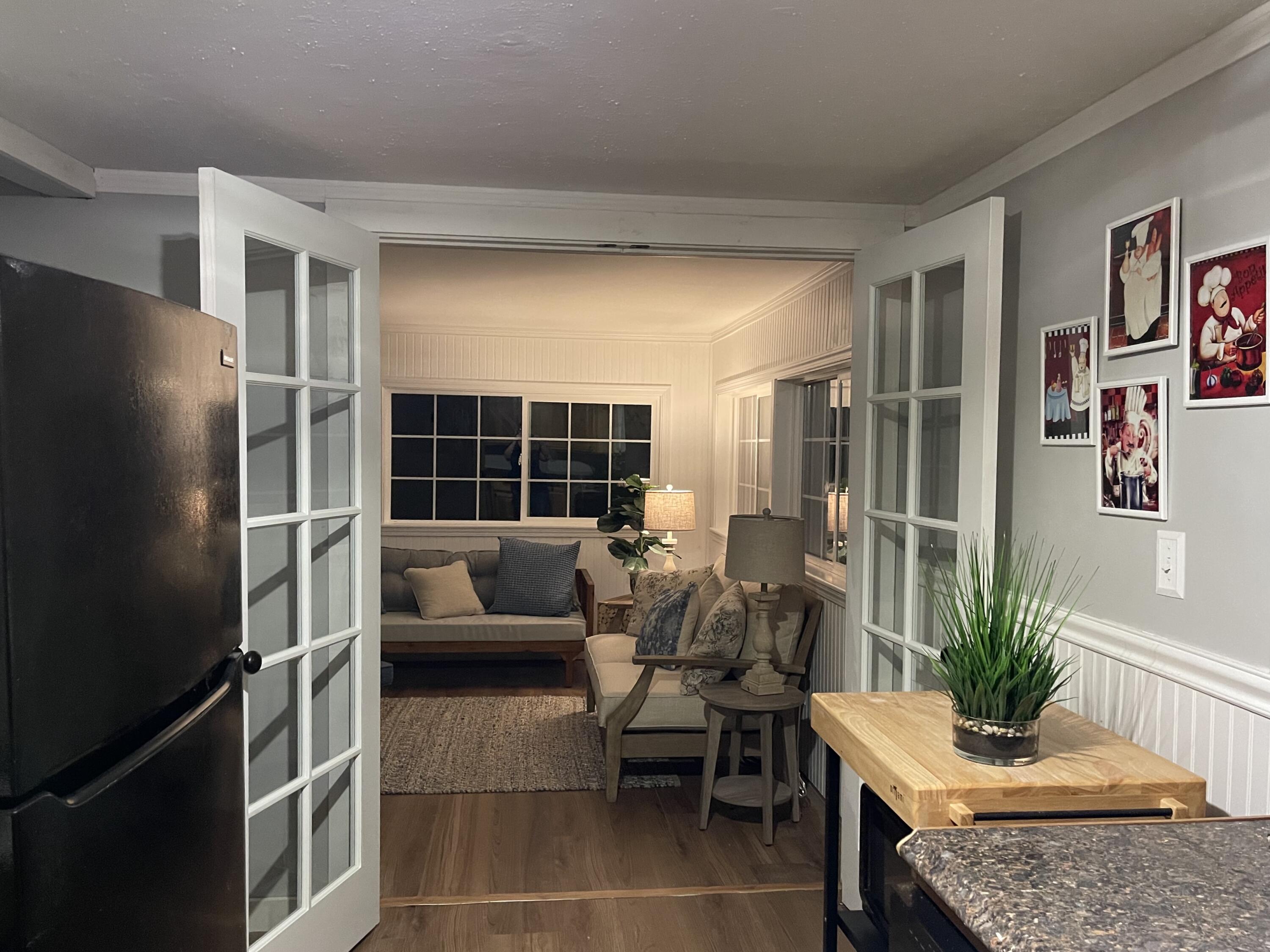 25 Walker Road Eastham, MA 02642 - Photo 9 of 17 a living room with furniture and a potted plant