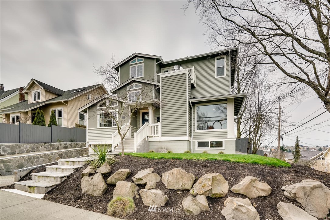 1533 33rd Avenue Seattle, WA 98122 - Photo 2 of 28 a front view of a house with garden