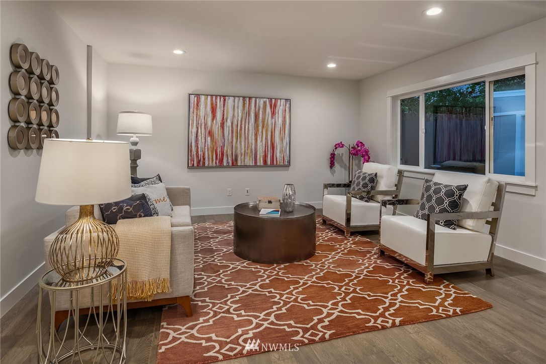 1533 33rd Avenue Seattle, WA 98122 - Photo 12 of 28 a living room with furniture and a window