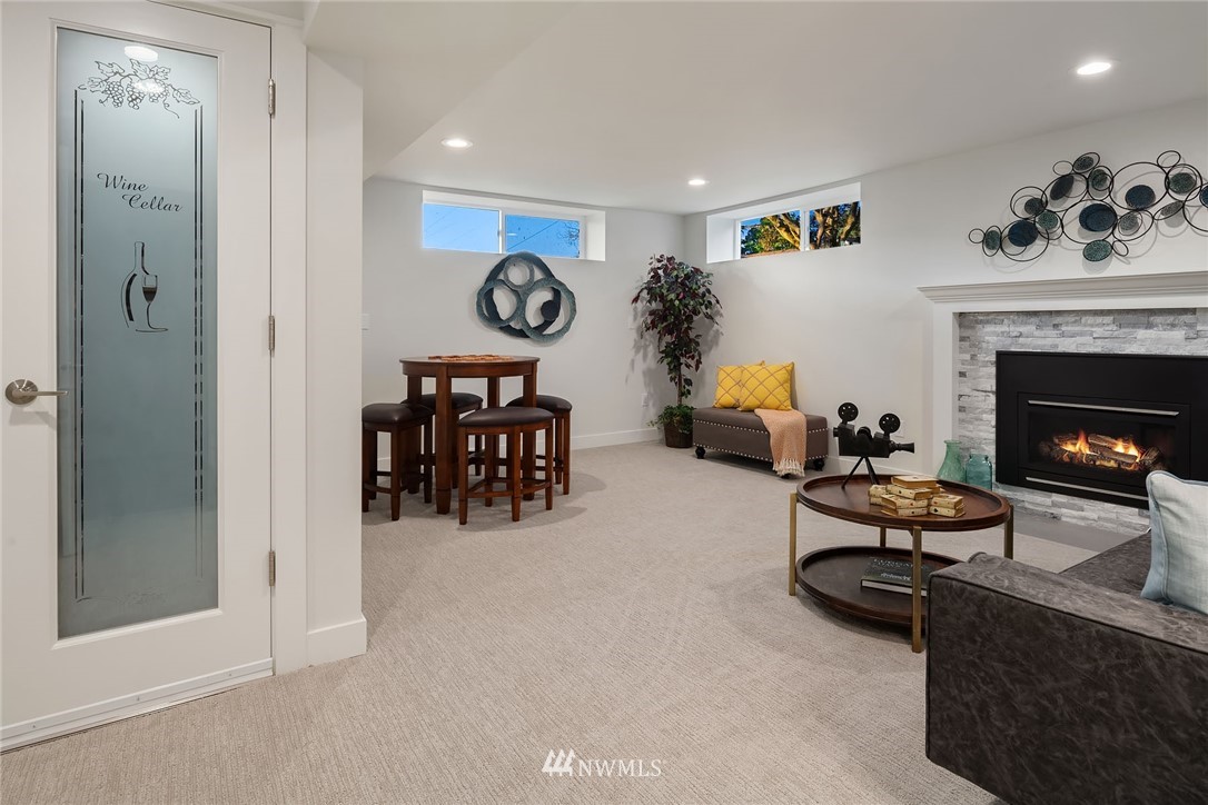 1533 33rd Avenue Seattle, WA 98122 - Photo 24 of 28 a living room with furniture and a fireplace