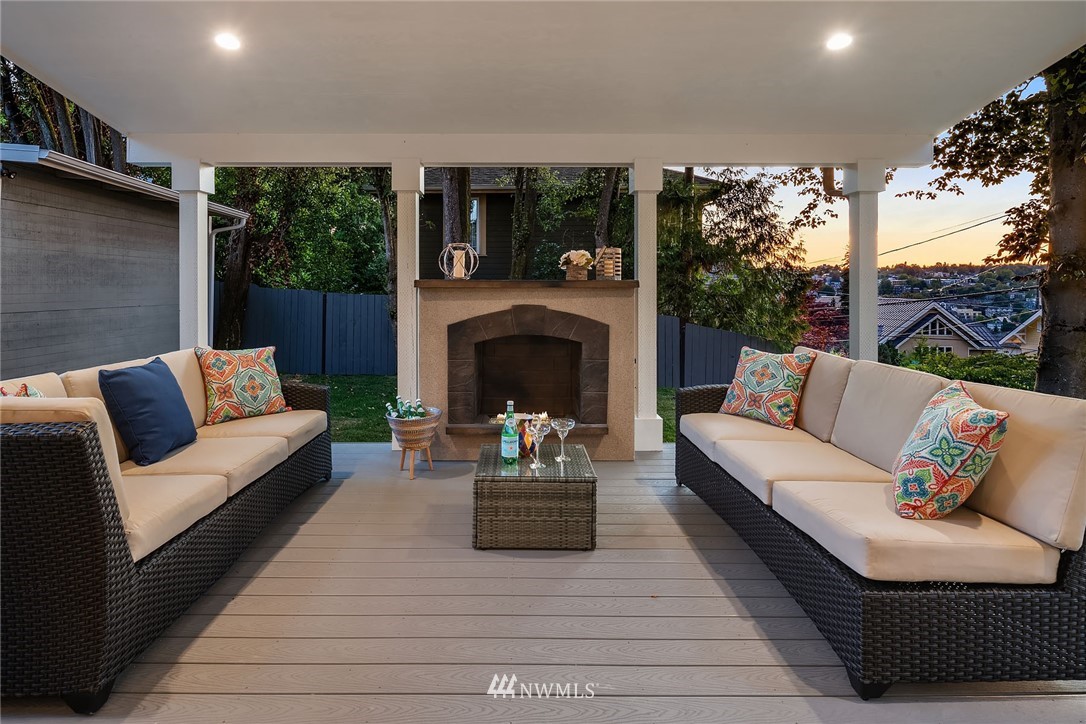 1533 33rd Avenue Seattle, WA 98122 - Photo 26 of 28 a living room with furniture and a fireplace