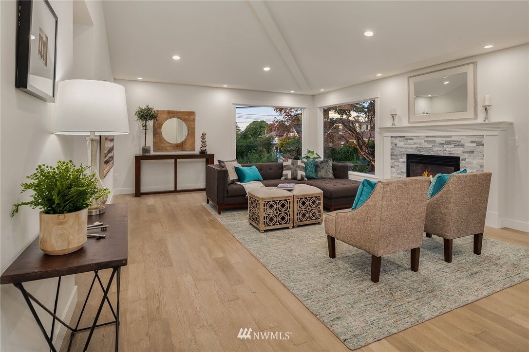 1533 33rd Avenue Seattle, WA 98122 - Photo 5 of 28 a living room with furniture and a fireplace