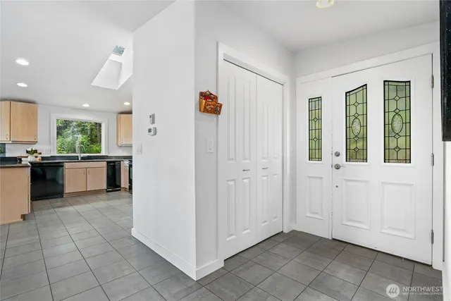 a view of a kitchen with a sink
