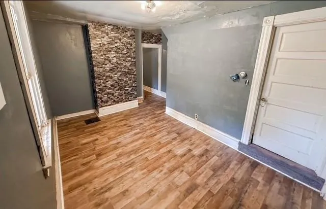 an empty room with windows