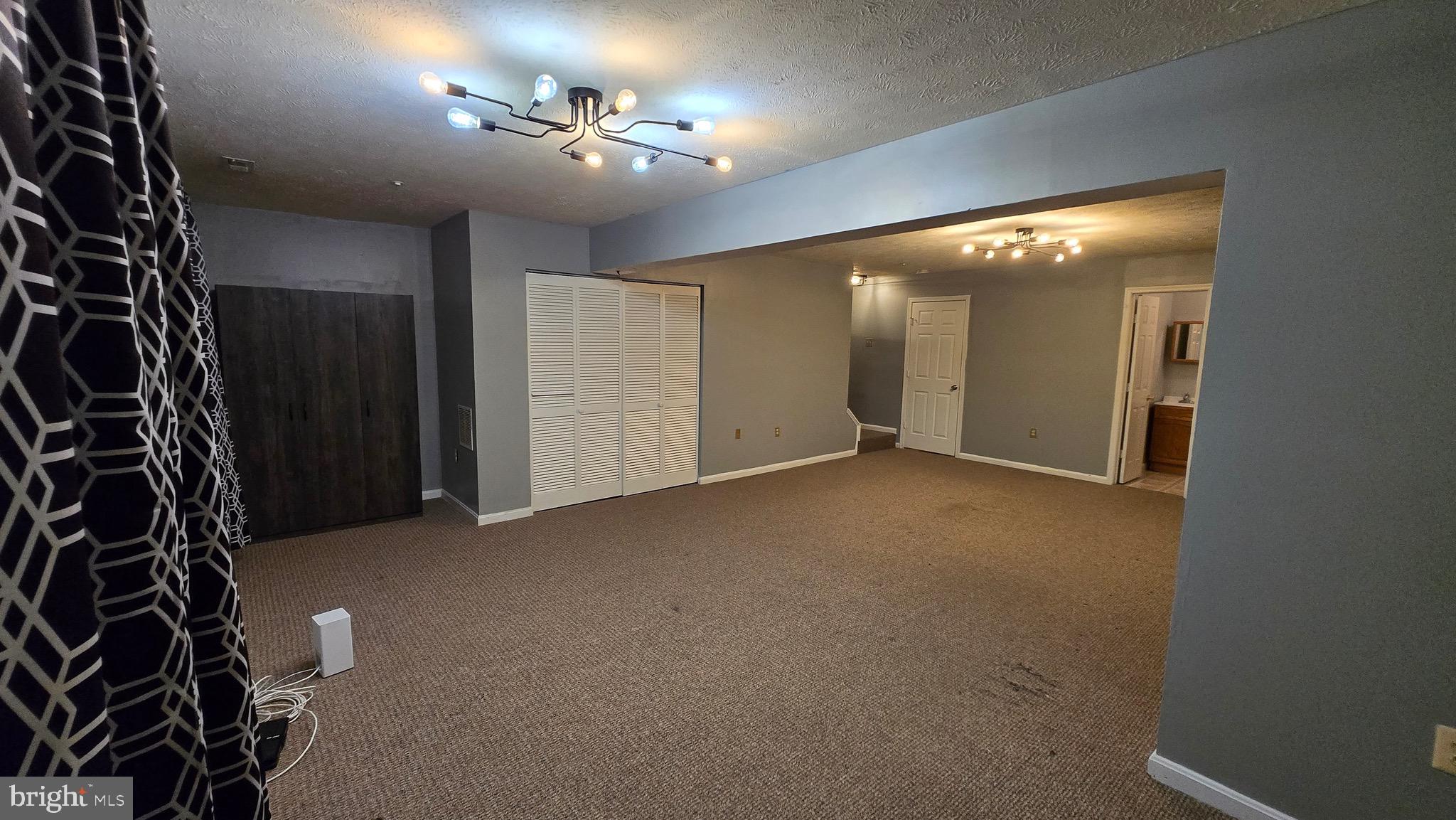 6565 Ronald Road Capitol Heights, MD 20743 - Photo 17 of 20 a view of a livingroom with a staircase