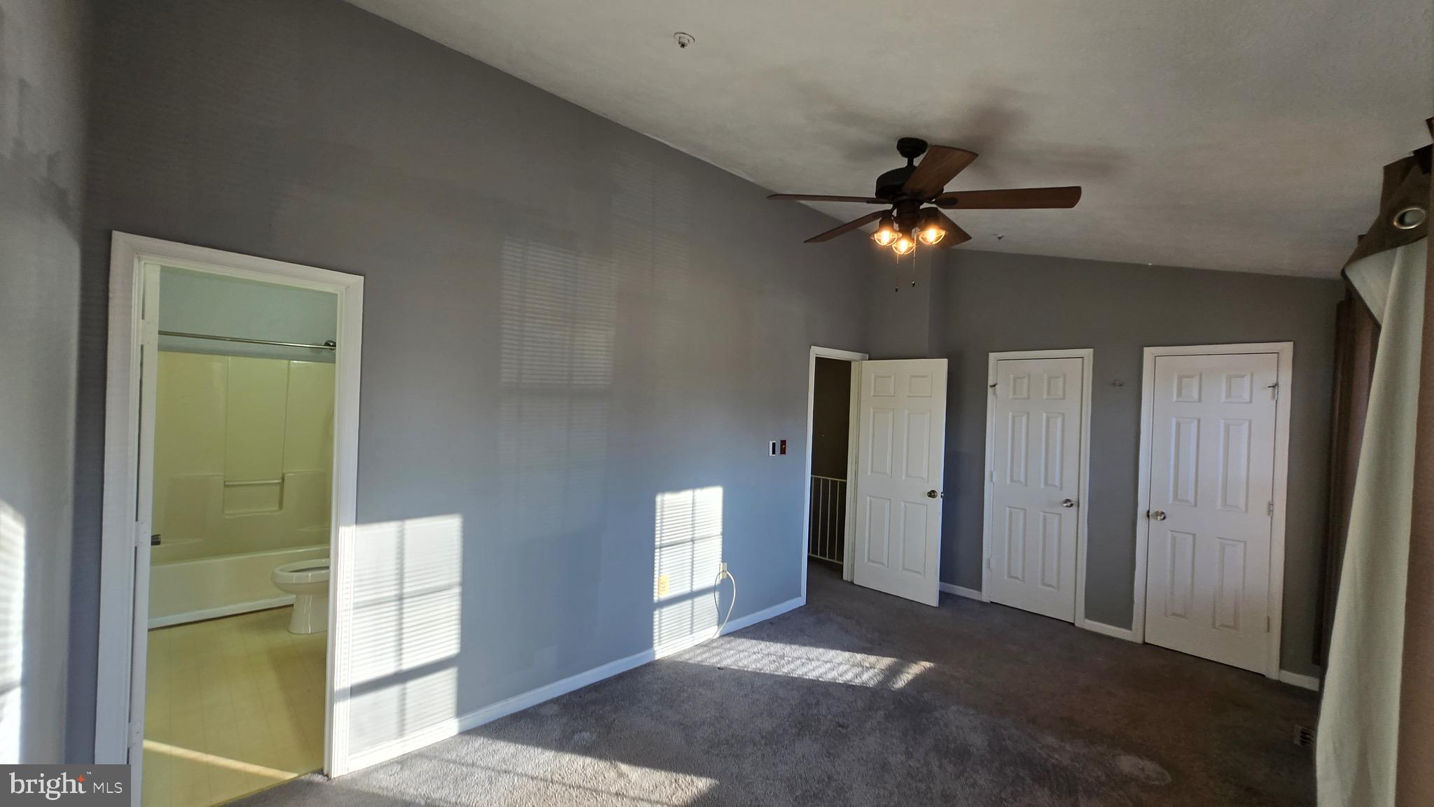 6565 Ronald Road Capitol Heights, MD 20743 - Photo 8 of 20 a view of a livingroom with a ceiling fan and entryway