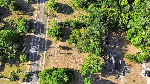 an aerial view of residential house with outdoor space