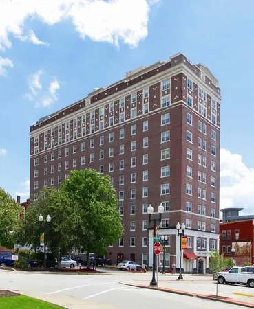 a view of a building with a street