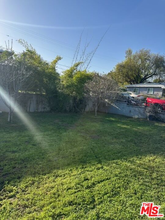 11578 Flower Street Riverside, CA 92505 - Photo 6 of 20 a backyard of a house with lots of green space