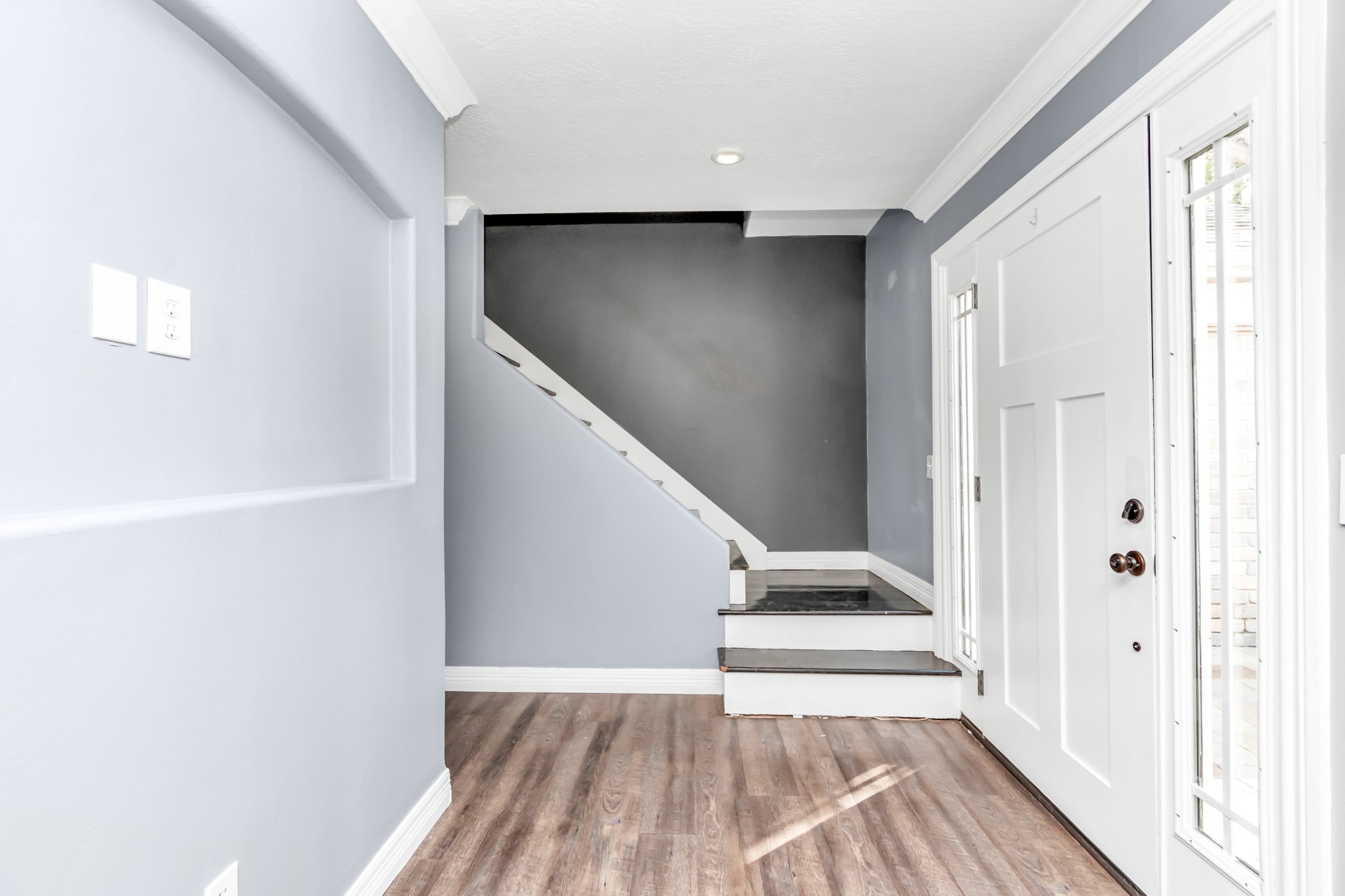 12418 Mill Ridge Drive Cypress, TX 77429 - Photo 13 of 36 a view of a hallway with wooden floor and staircase