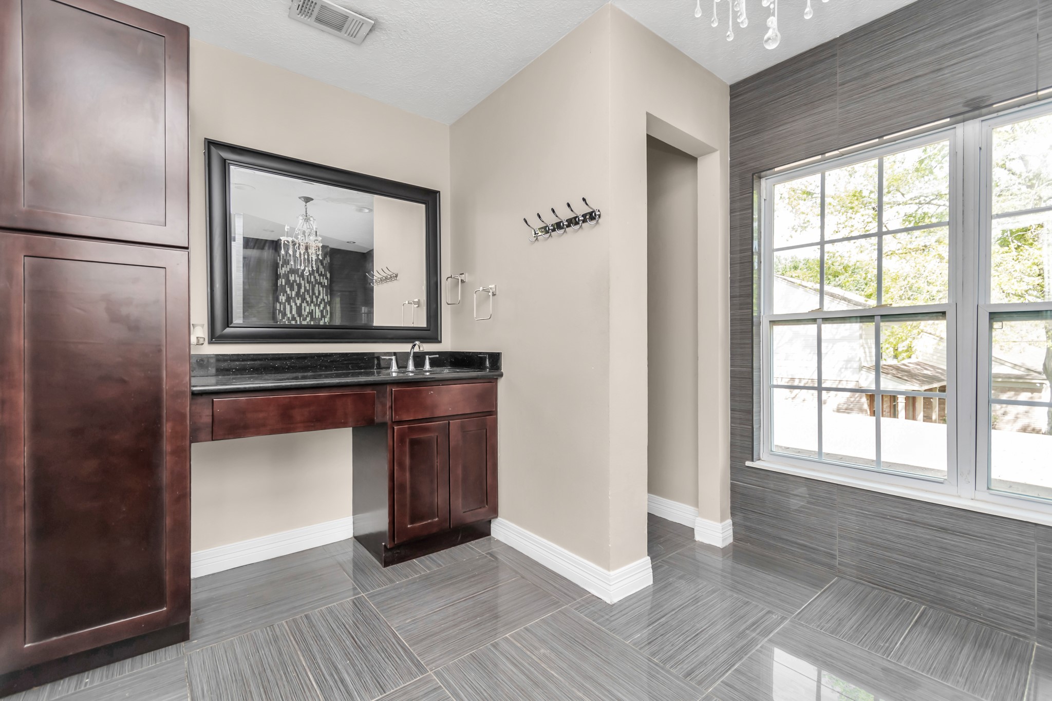12418 Mill Ridge Drive Cypress, TX 77429 - Photo 19 of 36 a view of an empty room with window and wooden floor