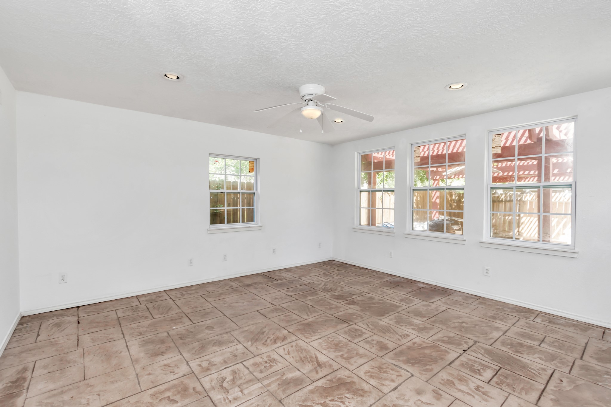 12418 Mill Ridge Drive Cypress, TX 77429 - Photo 27 of 36 a view of an empty room with a window